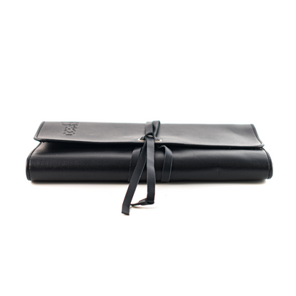 Trousse en cuir à fermeture lacet